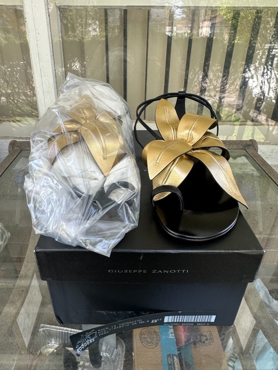 Giuseppe Zanotti Shoes - Giuseppe Zanotti Black Sandals with Gold Floral Bow